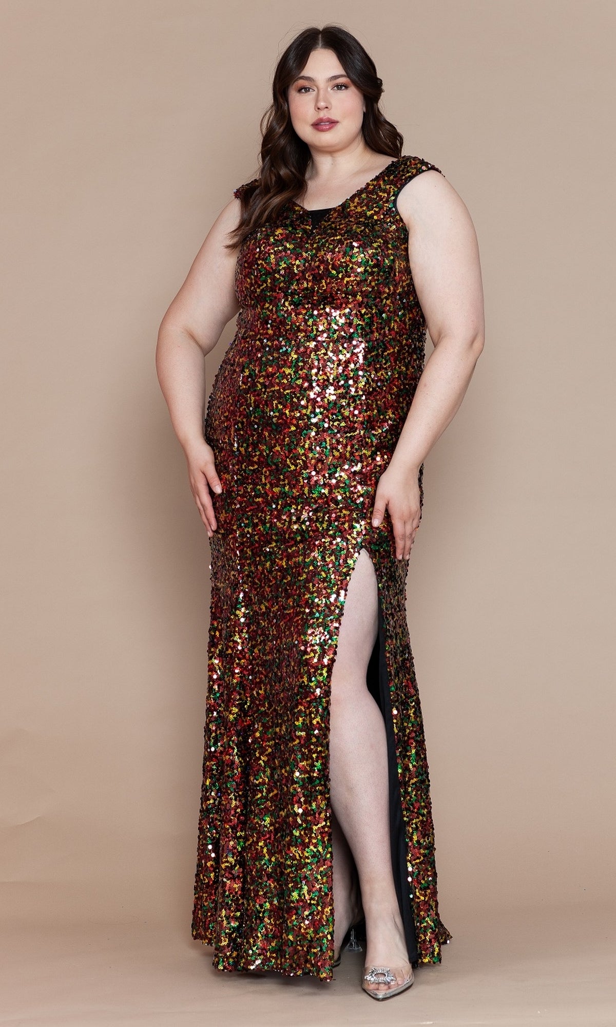 A woman stands against a beige background wearing the Multicolor Sequin Plus-Size Long Prom Dress W1124, featuring a sleeveless design and side slit.